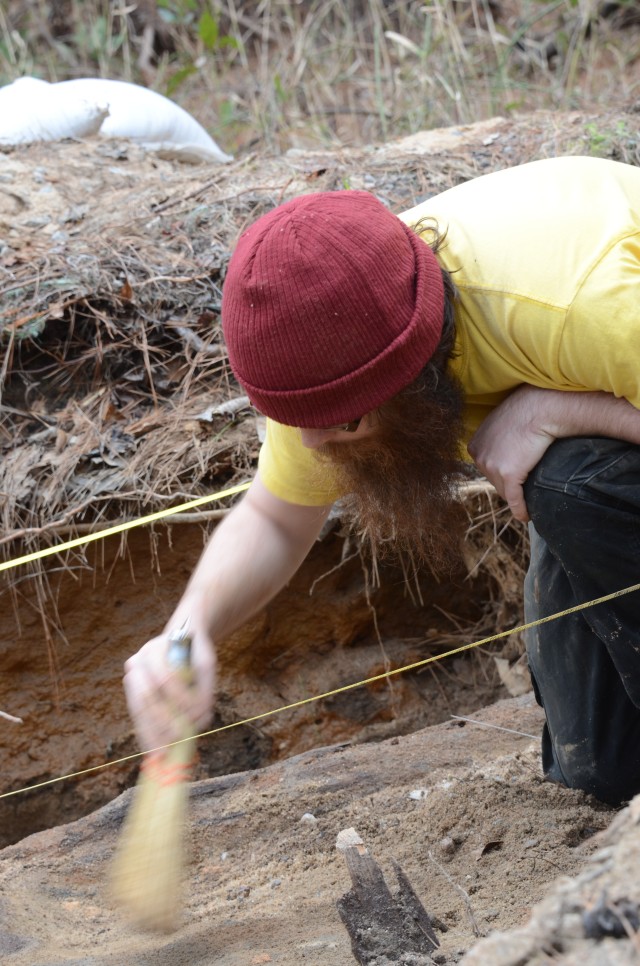 Brushing away the dirt