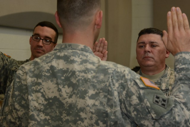 Staff Sgt. Mackie reenlists