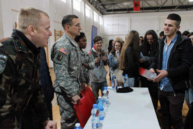 Soldiers talk with graduating Kosovo students about job opportunities