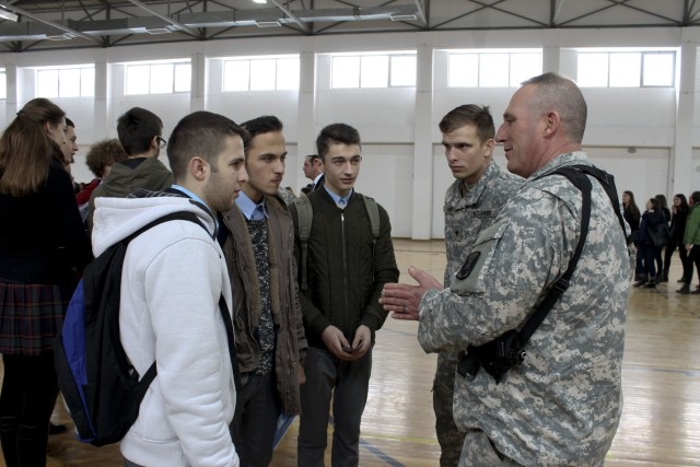 Soldiers talk with graduating Kosovo students about job opportunities