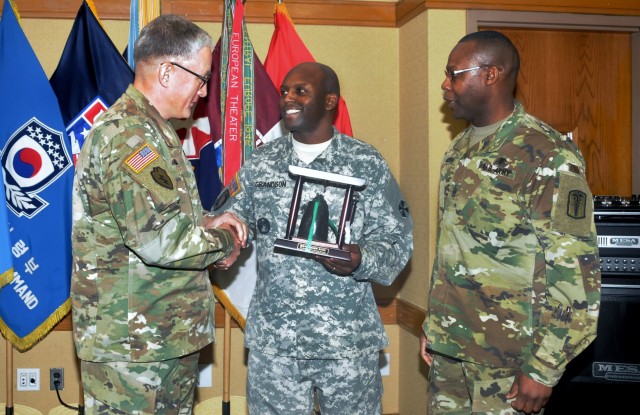 Sgt. Maj. Willie T. Grandison, Army Chief of Staff, G1, receives a gift at U.S. Army Garrison Yongsan, South Korea.