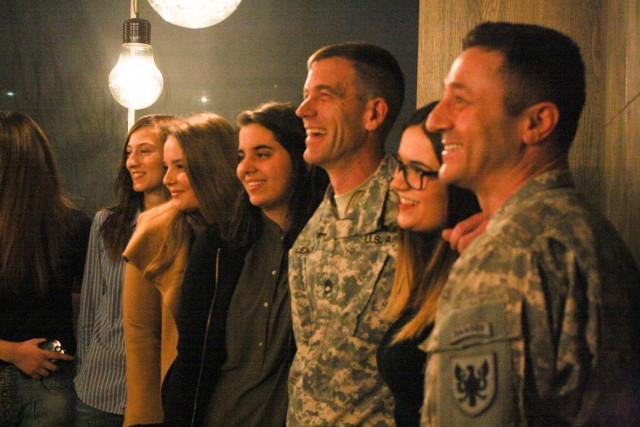 US Army Soldiers celebrate, Kosovo students pass English-speaking test