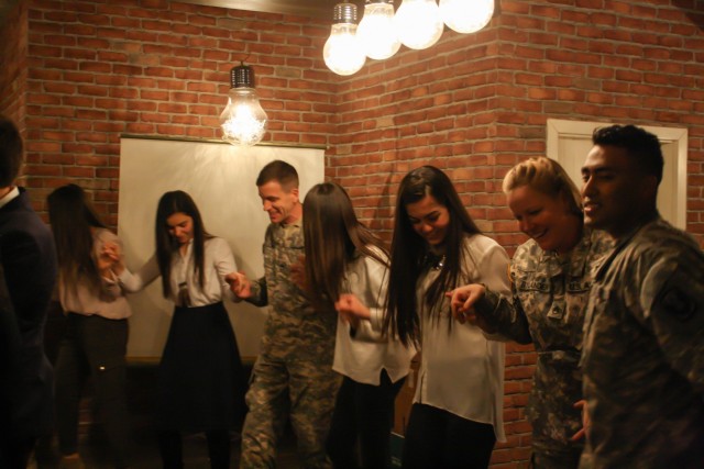 US Army Soldiers celebrate, Kosovo students pass English-speaking test