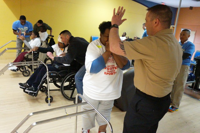 NCR service members give Special Olympics athletes motivation, support at four-day bowling event