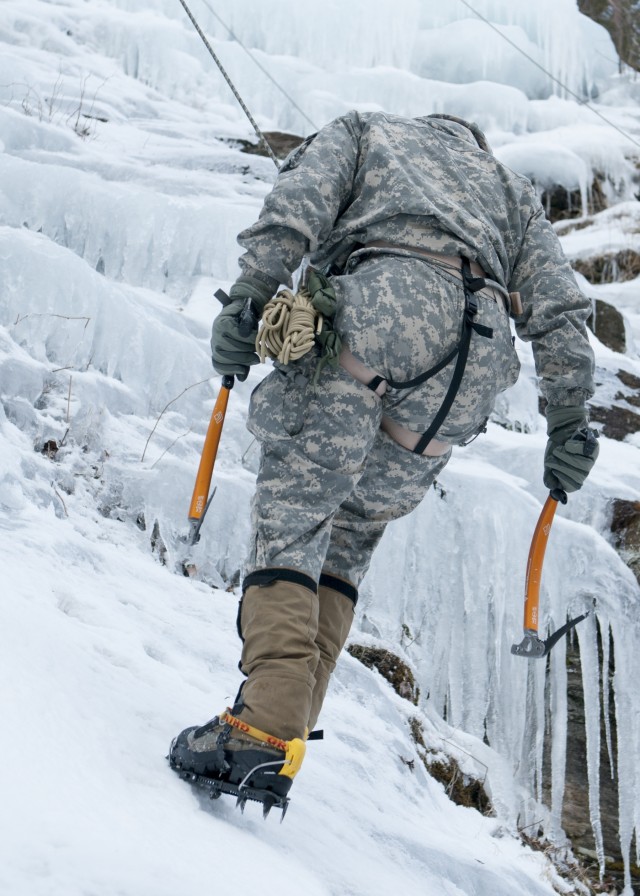 Vermont National Guard Soldier rappels down ice wall