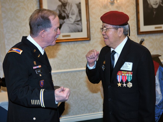 Silver Star recipient Col. (Ret.) William Reeder Jr. chats with former South Vietnamese Army officer Lt. Col. Li Van Me after Reeder Jr.’s awards ceremony.