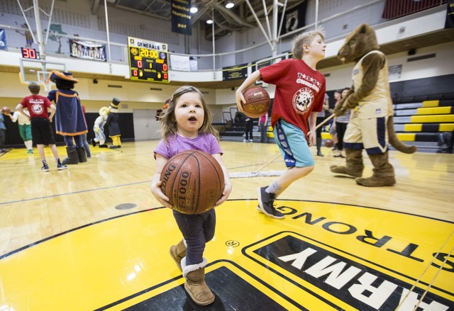 Atlantic Coast Conference mascots help greet children of fallen combat troops