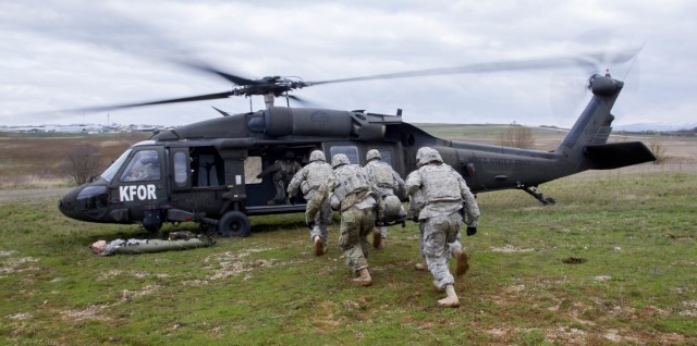 Infantrymen take to the sky during medevac training in Kosovo