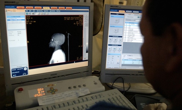 technician viewing medical imaging