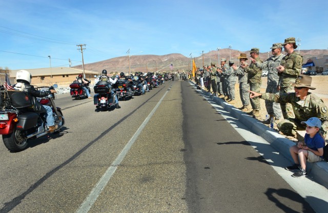 Soldiers and family members cheered for Vietnam War era Veterans