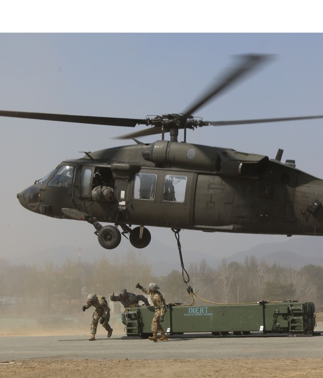 Guardian Battalion Teams with Aviators during Resupply Training