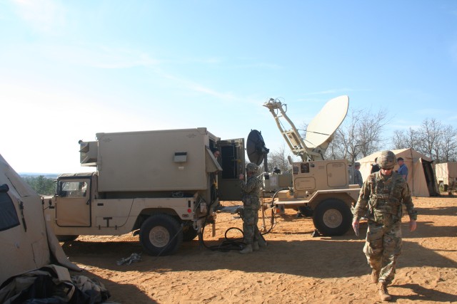 Warfighter Information Network-Tactical (WIN-T) Joint Network Node (JNN), left, and Satellite Transportable Terminal (STT), right