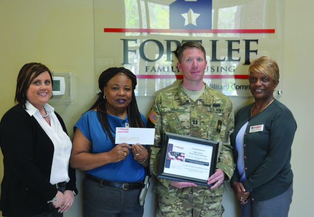 Family earns check for energy conservation