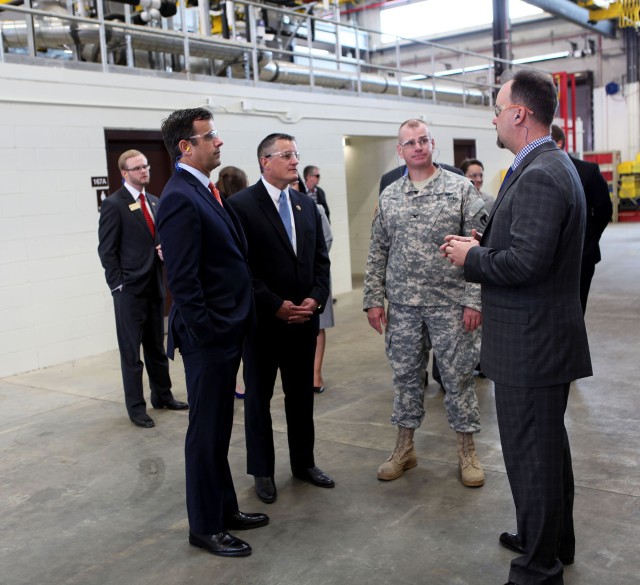 Texas and Arkansas Congressmen tour new facility