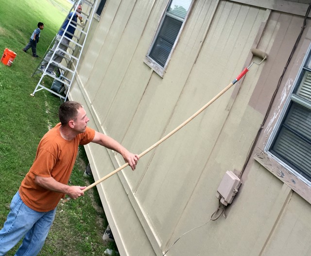 OTC Volunteers give back to Special Olympics Texas, uses paint