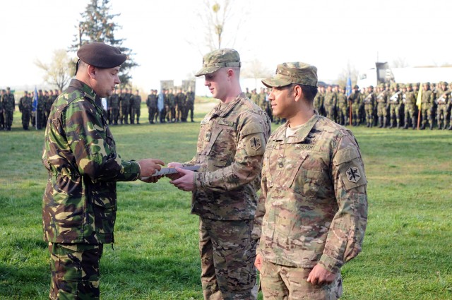 Soldiers receive Romanian award for aiding victims of car crash