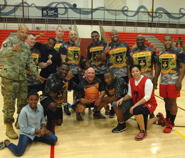 Post's senior officers, NCOs clash in annual basketball game