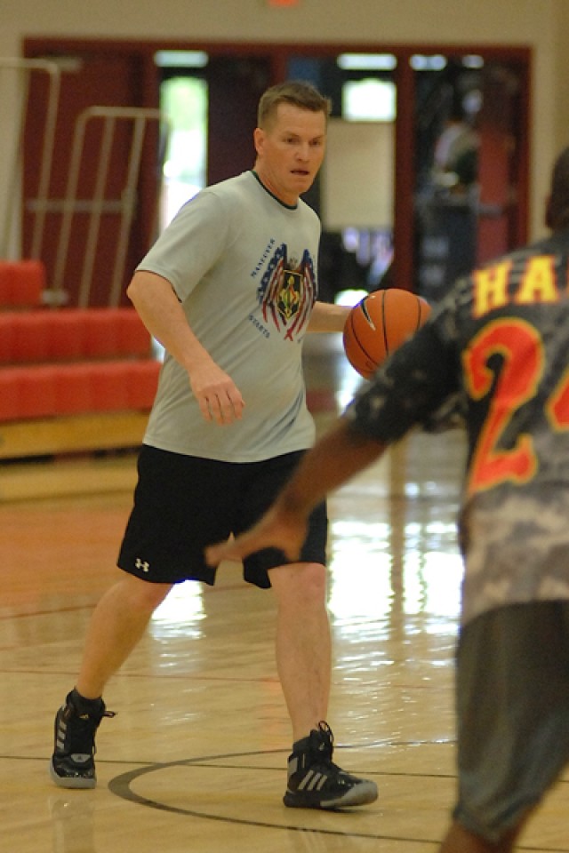 Post's senior officers, NCOs clash in annual basketball game