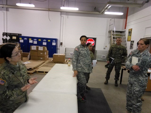 SPC Joyce Kim briefing the Department of the Army Inspector
