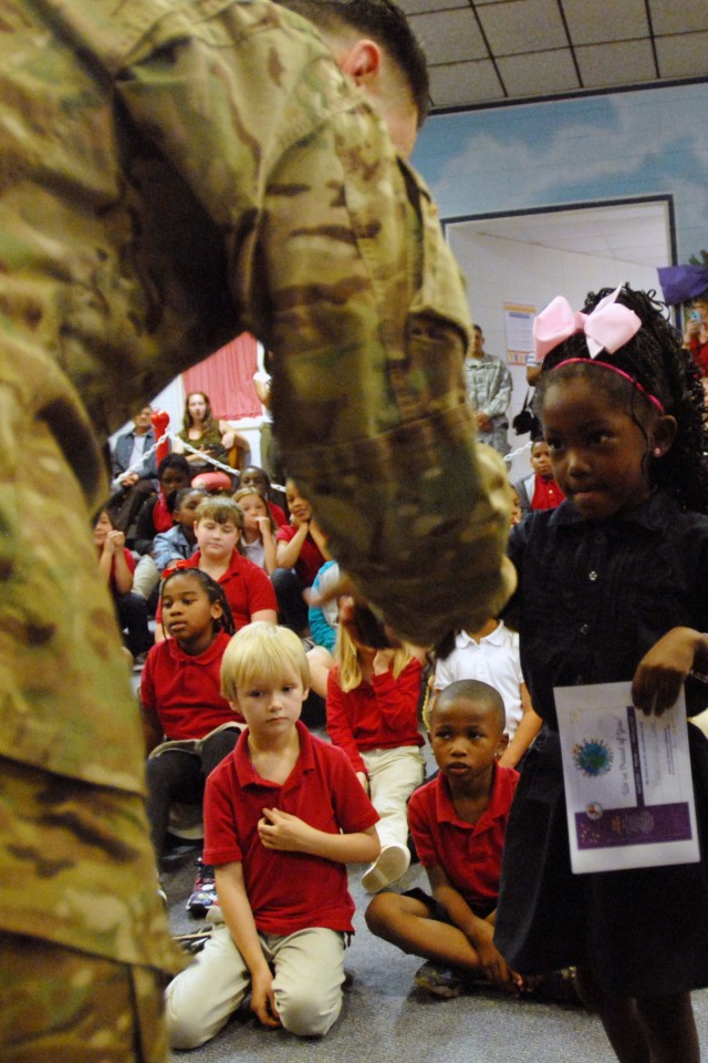 Soldier recognizes military children's sacrifices
