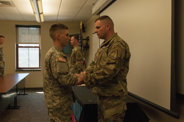 Soldier Shakes Hands with Sergeant