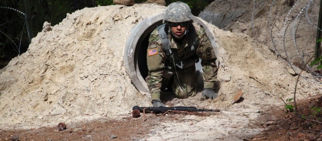Completing urban obstacle at Best Warrior Competition
