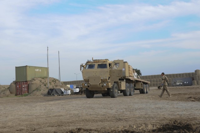 Staff sergeant prepares to deliver ITEF supplies