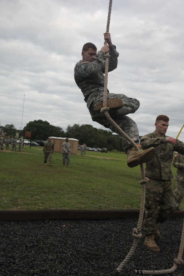 Staff Sgt. Brendan Hagens climbs the robe
