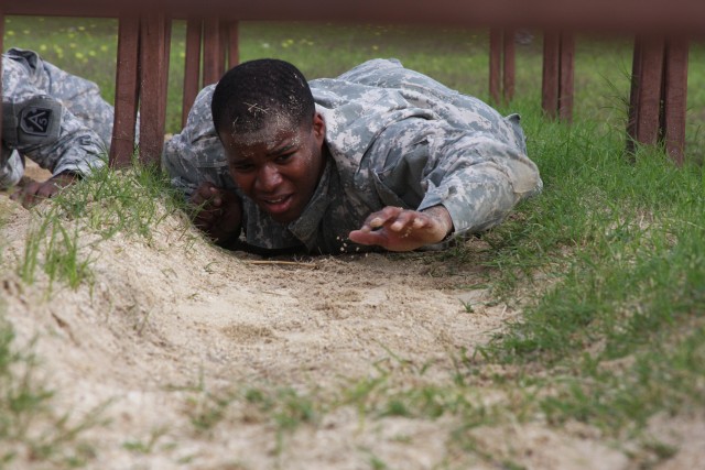 Spc. Mosquera reachs for the finsh line