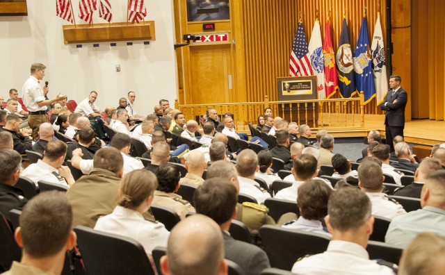 British Fellow Col. Kevin Copsey compares US-UK impressions on the All-Volunteer Army with Hon. Murphy