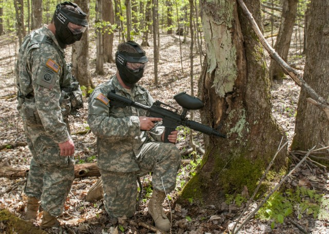 Team Leader Checks Soldier Welfare and Equipment