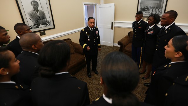 Via commissions 13 Army second lieutenants from alma mater