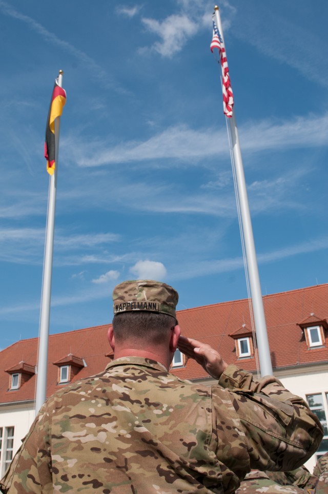 Soldiers Salutes Flag