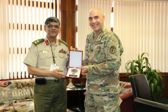 TAMC Commander conducts cultural gift exchange with Bangladesh military medical leader