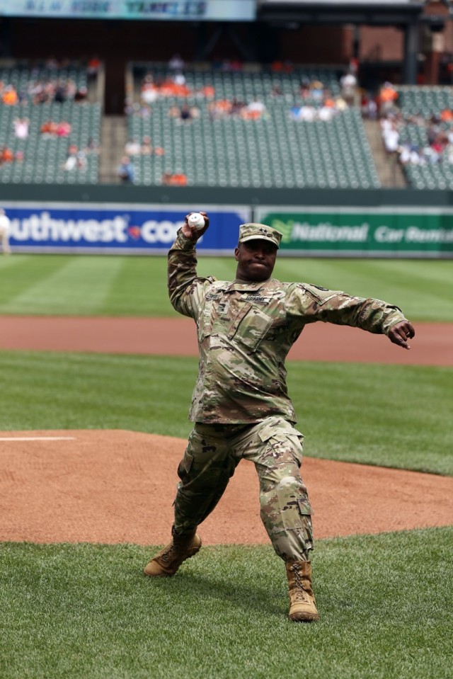 Senior Commander throws first pitch to honor APG
