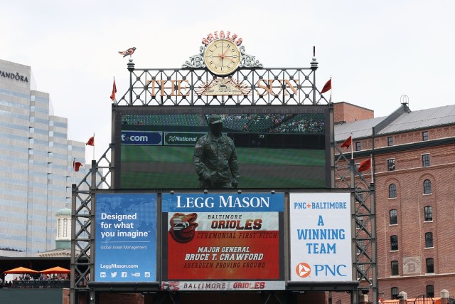 Senior Commander throws first pitch to honor APG