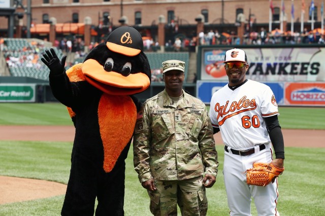 Senior Commander throws first pitch to honor APG