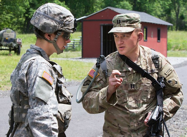 Capt. Frederick Waage explains the drone gun to a Cadet
