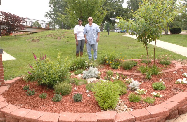 Davidson Fitness Center flowerbeds a labor of love: Honor Soldiers, community