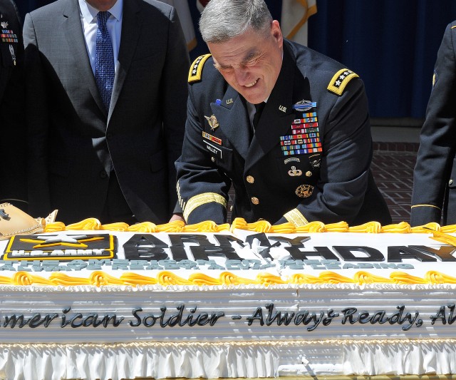 CSA Slicing Through 241st Birthday Cake