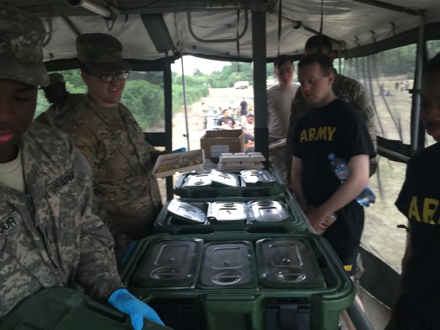 Cooks serving a special steak dinner