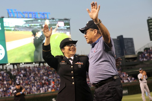 Army Reserve soldier is honored with her father at Cubs Father's Day game