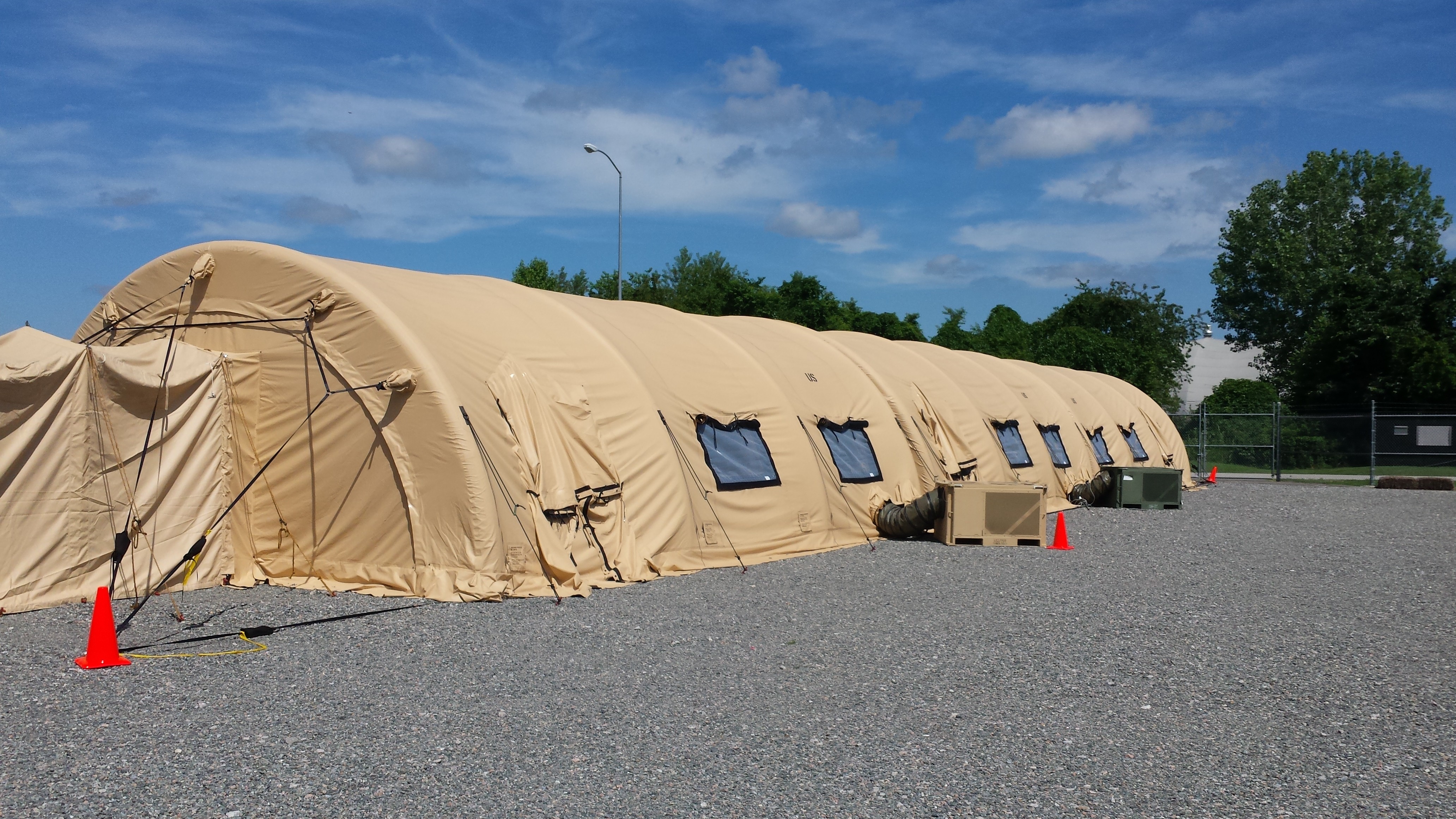 Inflatable heavy duty military tents