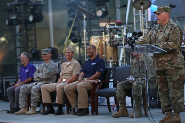 Torch is passed during 2016 Warrior Games closing ceremony