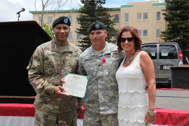 Maj. Gen. Patrick Sargent awards Col. Pete Eberhardt the Legion of Merit.