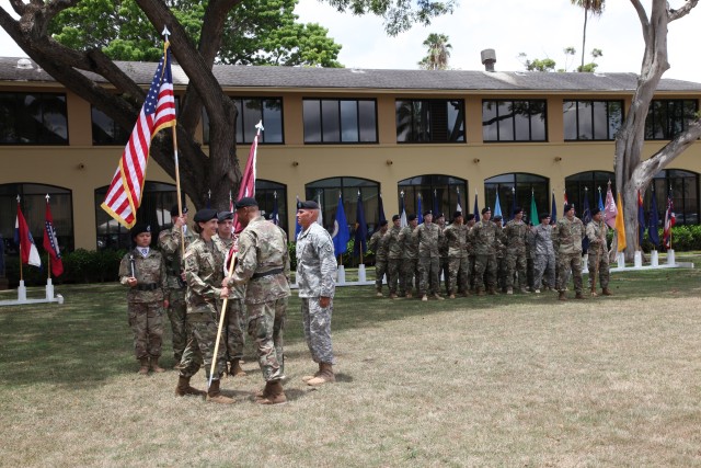 Maj. Gen. Patrick Sargent passes the U.S. Army Health Clinic - Schofield Barracks colors onto incoming commander, Col. Deydre Teyhen on June 23, 2016.