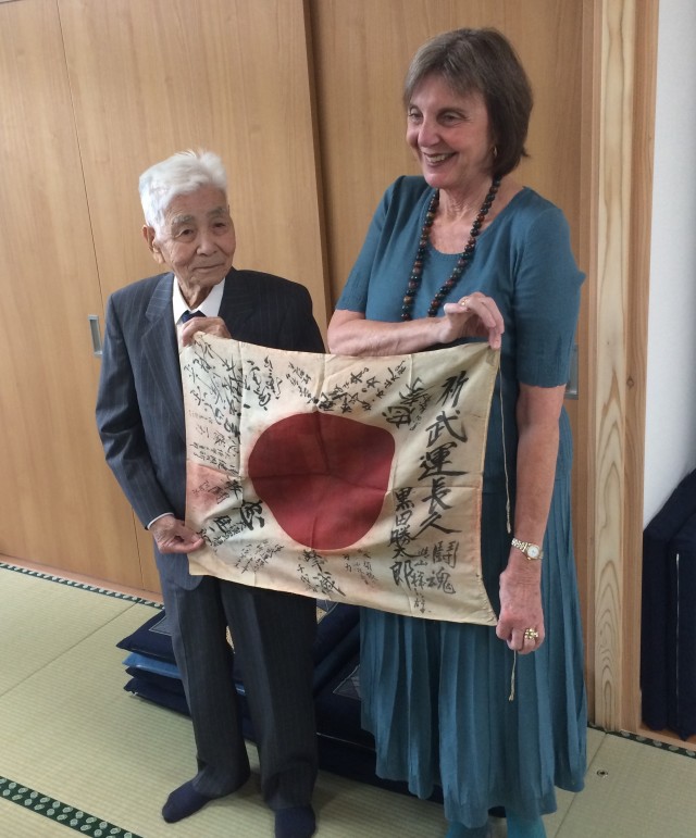 Couple reunites Japanese World War II veteran with flag lost for 70 years