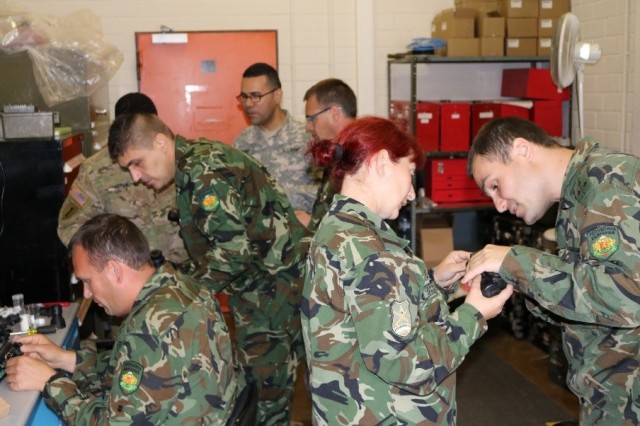 Illuminating experience: Baumholder maintainers help Bulgarian soldiers see through 'NVGs'