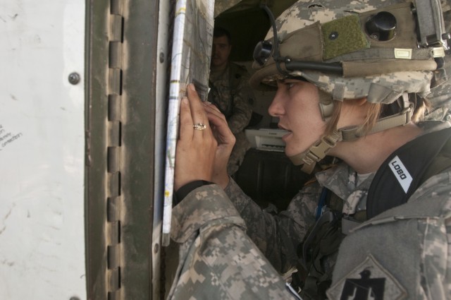 An Oklahoma first:  First qualified female combat arms officer conducts fire missions