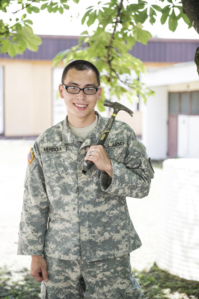 Minnesota Guard member experiences 'new things' as he helps renovate a schoolhouse